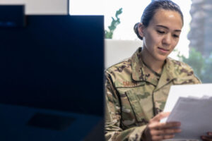 air force member at computer