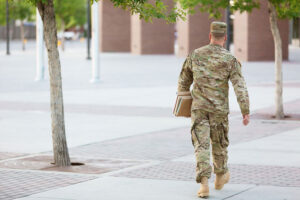 soldier carrying books