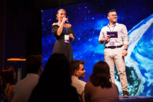 conference speakers on stage